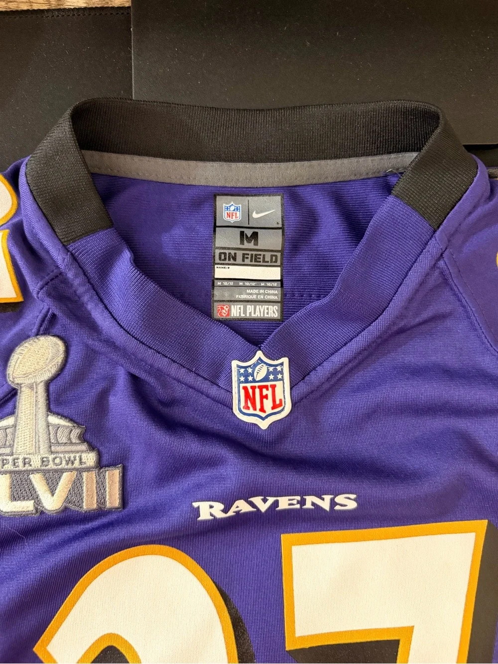 Nike Baltimore Ravens Youth Size M Purple and Gold #27 Football Jersey